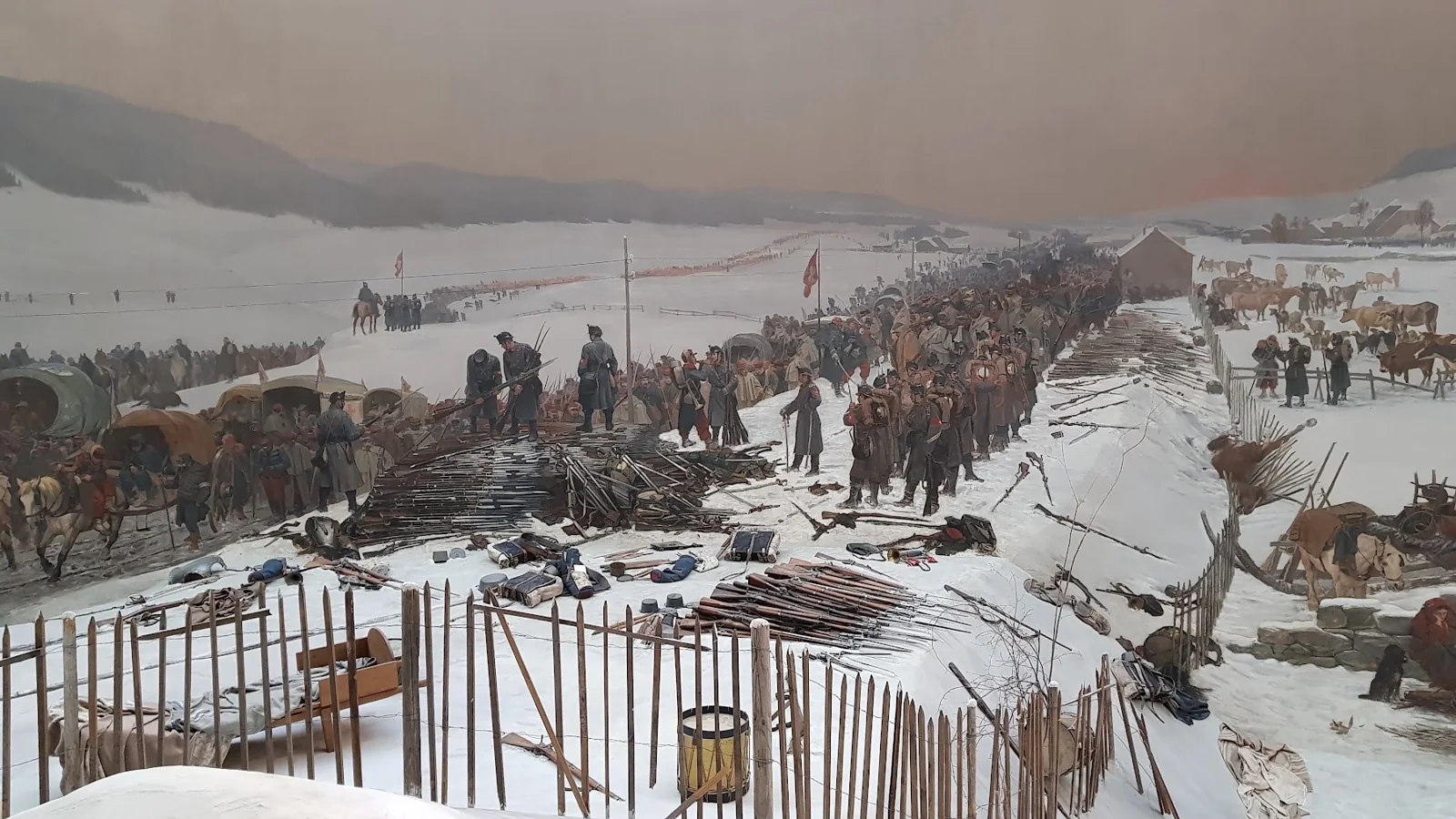 Pintura do Bourbaki Panorama com soldados e armas depositadas na neve